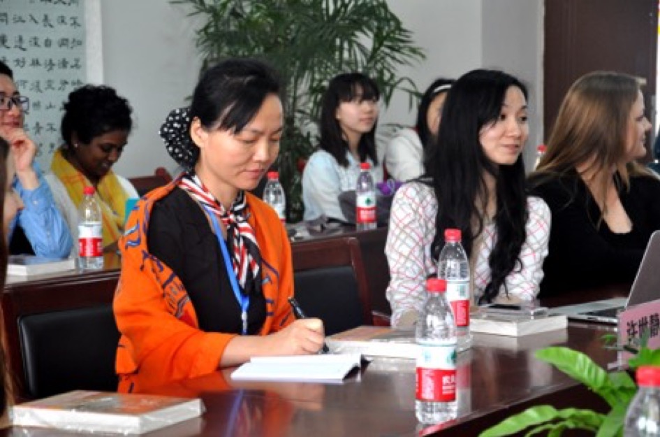 Dr. Xu with UW 2015 cohort at a local school in Chongqing