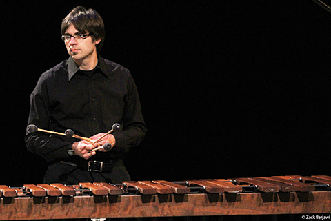 Dr. Nicholas Papador playing marimba in concert
