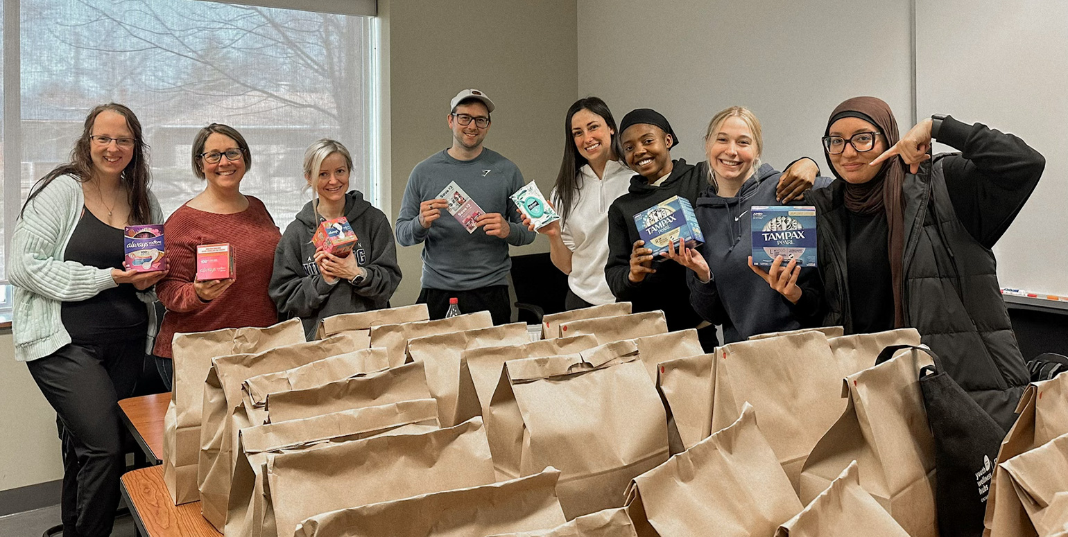 Nursing sessional instructor Katherine Beaumont and third-year students prepare personal care product donations