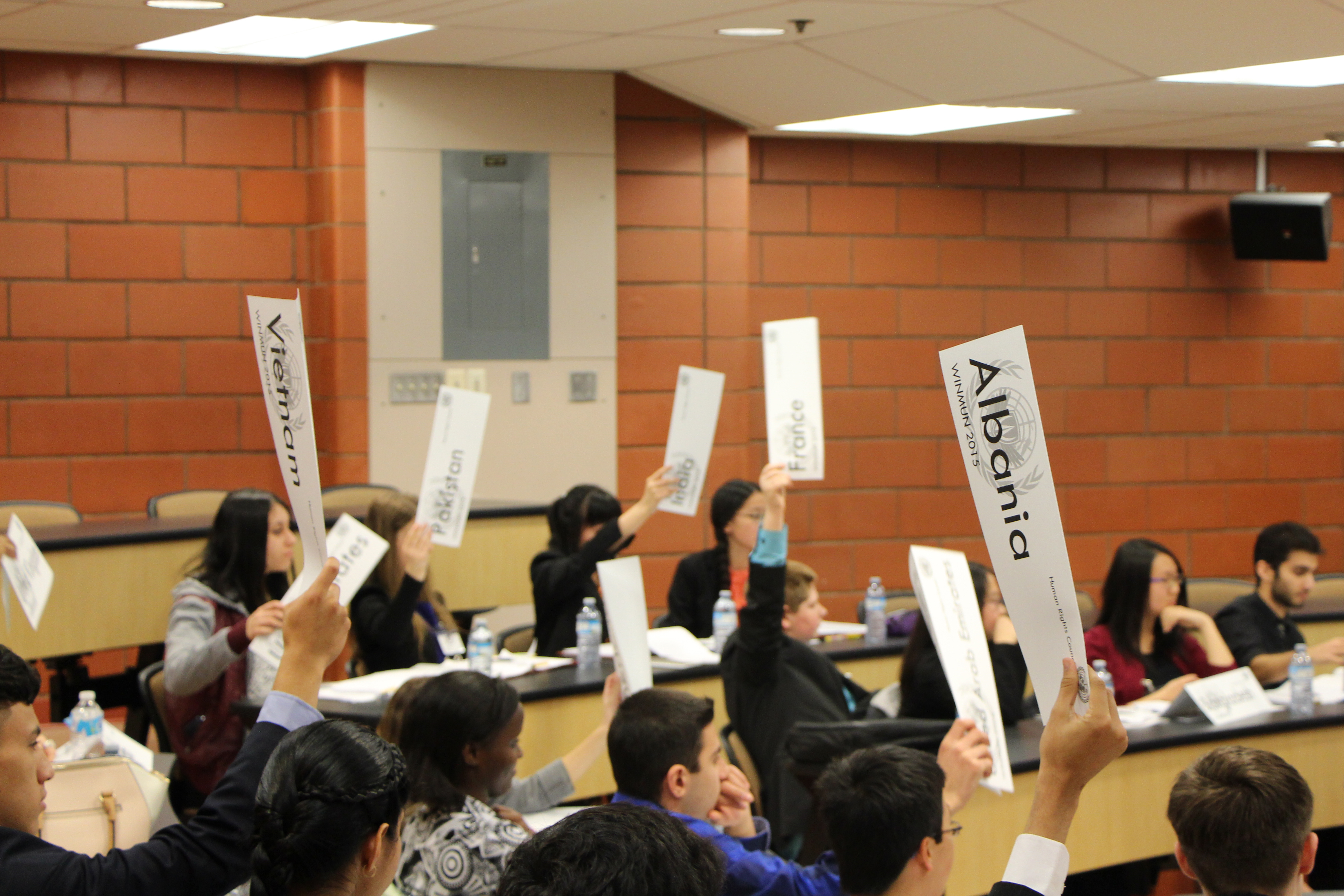 Students engaged in debates on global issues during a model UN conference organized by the University of Windsor Model United Nations Club (WINMUN) and the Political Science department.
