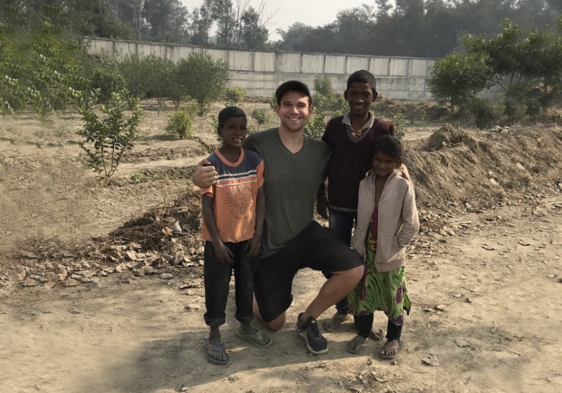 UWindsor student Dylan Verburg was often greeted by youngsters Kishan, Guddu, and Maya during his trips to a lake outside the Indian capital city of New Delhi, where he was conducting his master’s research on water quality.