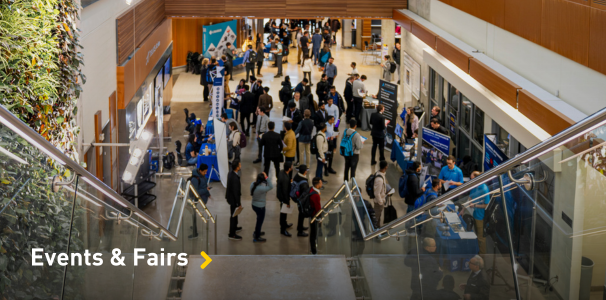 Job fair with students and employers, shot from above.