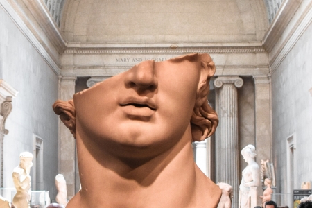 A half-destroyed head of a marble statue.