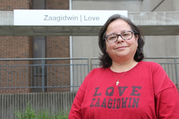 Jaimie Kechego in front of Turtle Island Walk pod dedicated to Love