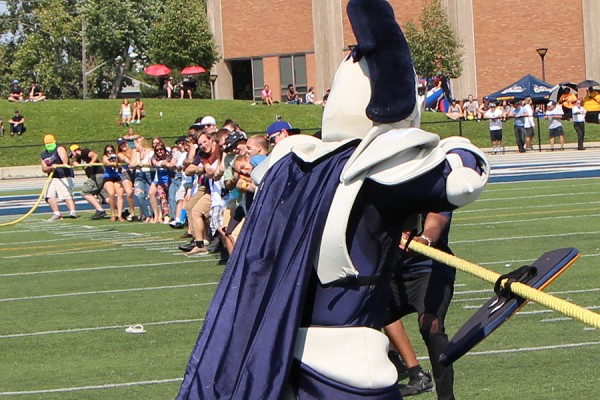 Lancer mascot Winston single-handedly holds off a team of tuggers-of-war.