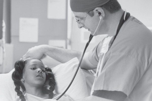 nurse caring for sick child