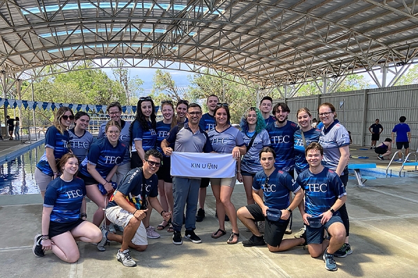 UWindsor kinesiology students wearing apparel from Tecnológico de Costa Rica in an athletics facility.