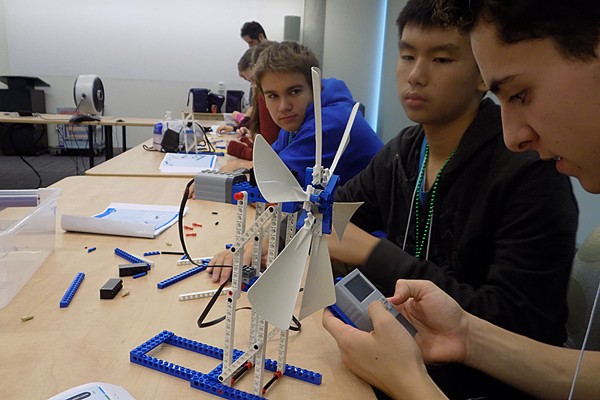 Jackson Taylor, Isaac Wu and Dane Quinn assemble a wind turbine.