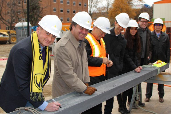 Dean of science Chris Houser leads a line of University faculty, students, and officials