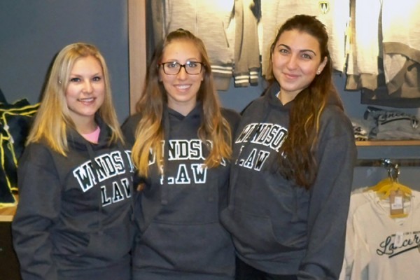 eghan Harrogate, Alissa Scarcello, and Alyssandra Antonangeli wearing Windsor Law sweatshirts