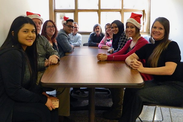 Student Success and Leadership Centre staff sit around a table