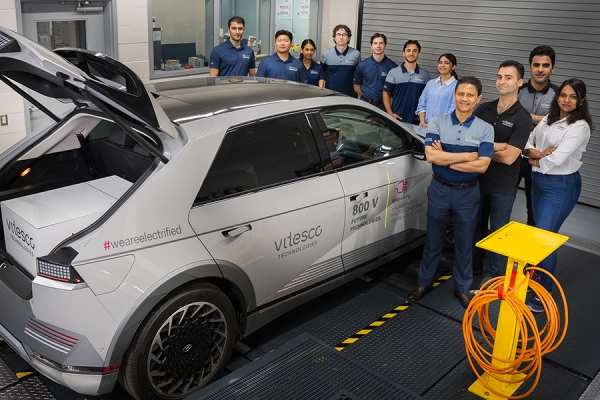 Officials from the CHARGE Lab and Vitesco in Narayan Kar&#039;s lab.