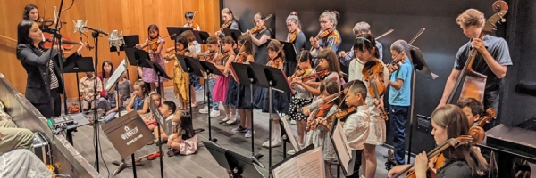 students playing string instruments