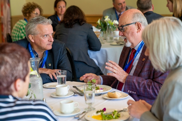 Robert Gordon converses with Tecumseh mayor Gary McNamara