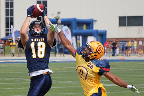 Lancer receiver Evan Pszczonak grabs a pass.