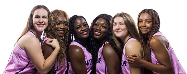 Lancer athletes wearing pink jerseys