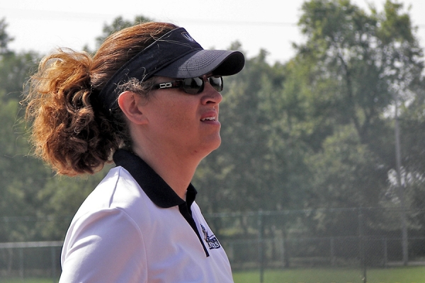 Francine Stadler wears visor and stares into distance