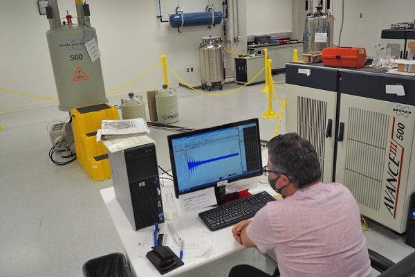 John Hayward using a Nuclear Magnetic Resonance machine.