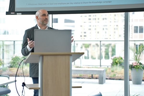 man at lectern