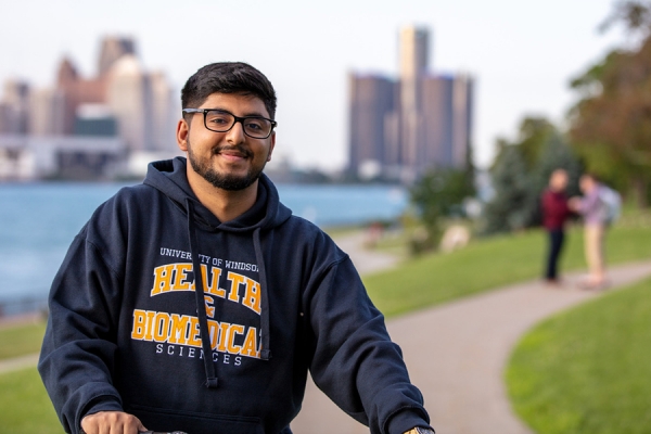 student wearing Lancer sweatshirt