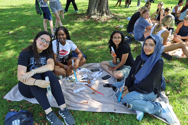 students enjoying picnic-style activity