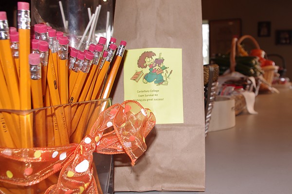 Canterbury College distributed school supplies, snack foods and fresh produce to students during its communal dinner Wednesday.