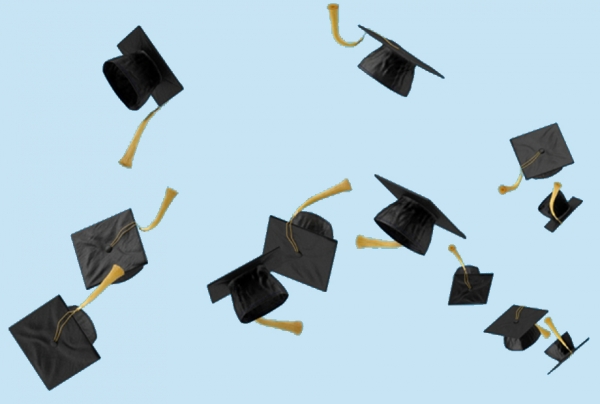 grad caps tossed in air