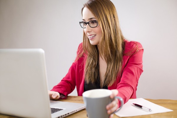 woman working on laptop computer