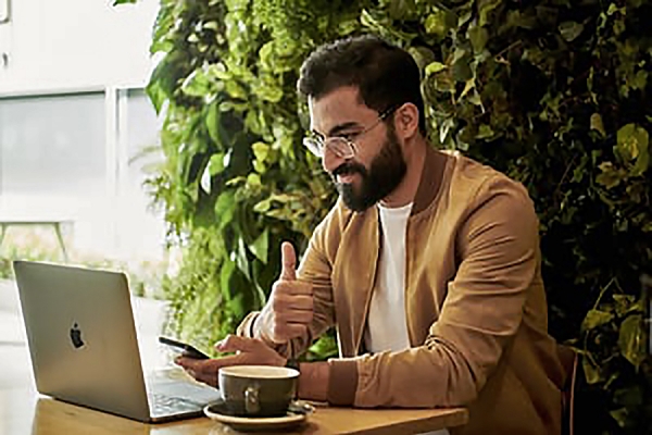 person on laptop computer