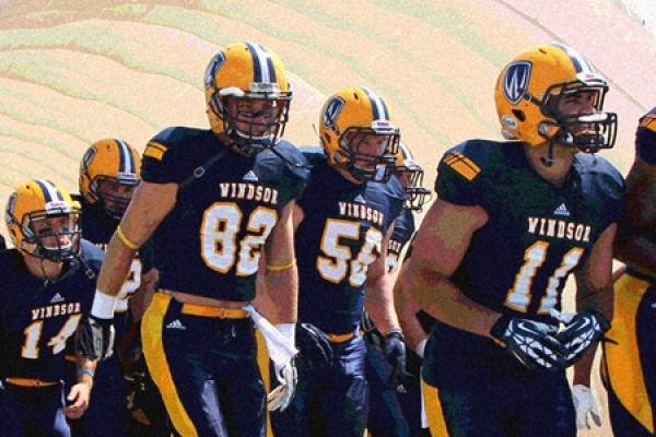 Football players enter stadium