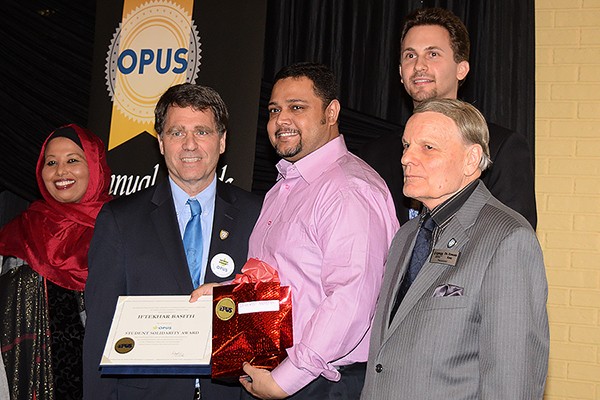 Executive director Maryan Amalow, award winners Clayton Smith and Iftekhar Basith, staffer Steve Jancev and president Ed King.