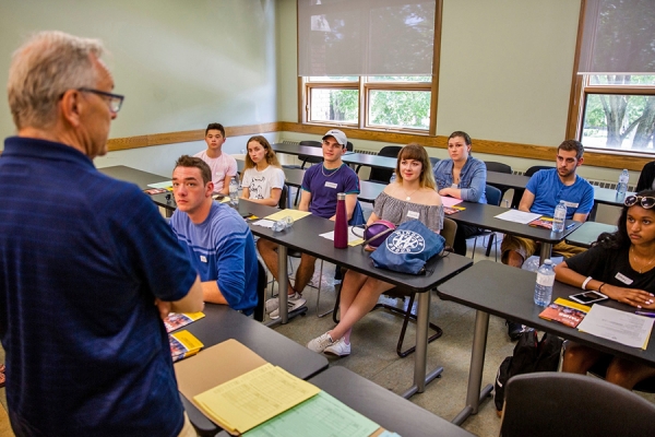 professor addressing new students