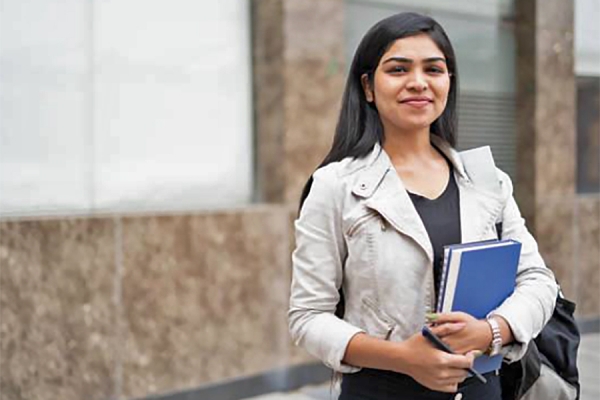 young woman holding legal texts