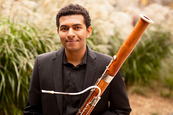 Sam Fraser holding bassoon