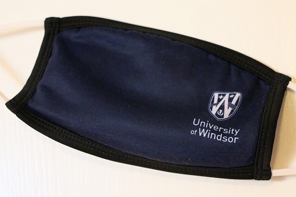 Face mask bearing UWindsor logo