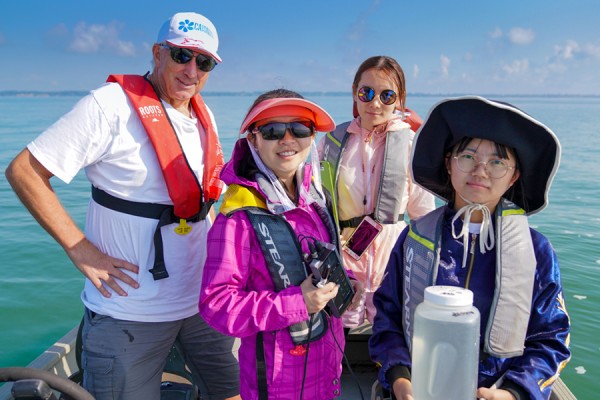 Hugh MacIsaac accompanies students from China’s Yunnan University on a boat trip