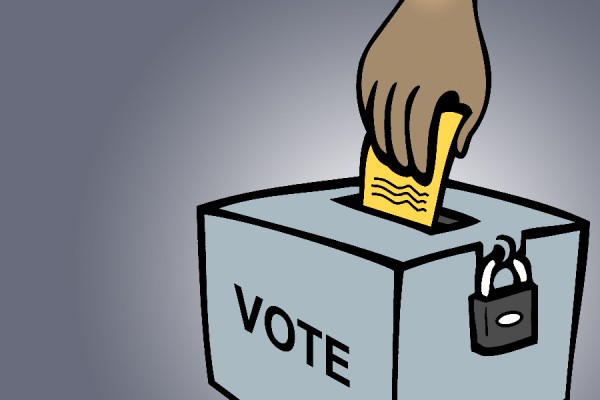 cartoon hand placing ballot in box