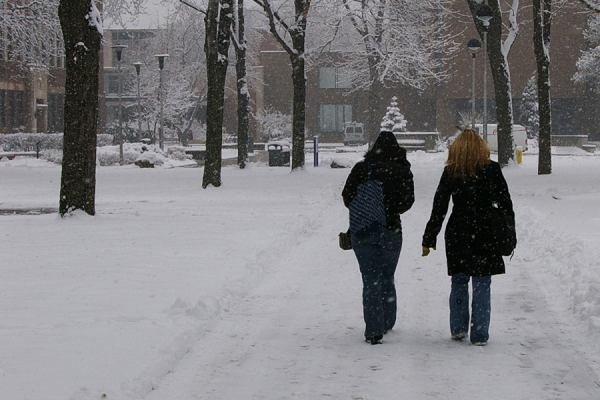 students walking in snow