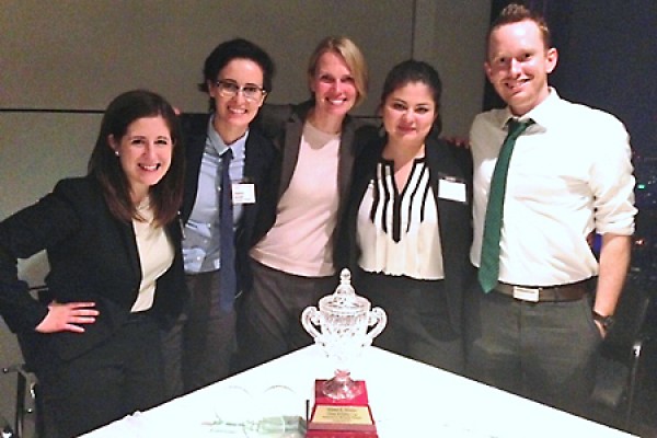 student team poses with trophy