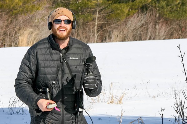 Blaine Landsborough collects acoustic recordings in the snow.