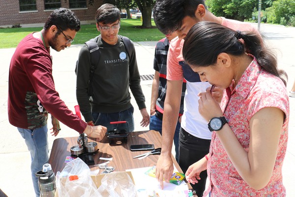 students making their own buttons