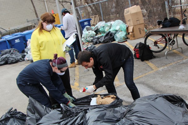 Morgan Purdy (B.Ed 2014) and Taylor Purdy (MASc 2014) work with Mike Busuttil 