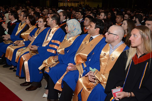 men and women in academic gowns