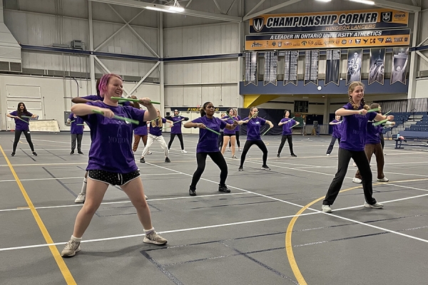 Girls in Motion participants are introduced to poundfit.