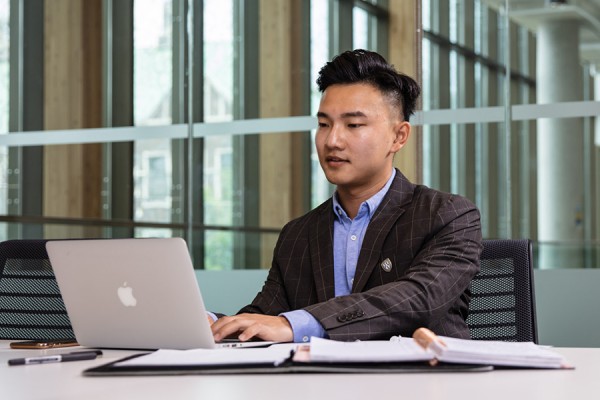 young person at laptop computer