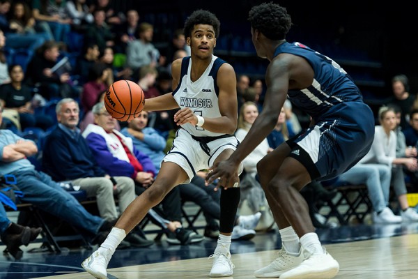 Shakael Pryce shakes off a defender