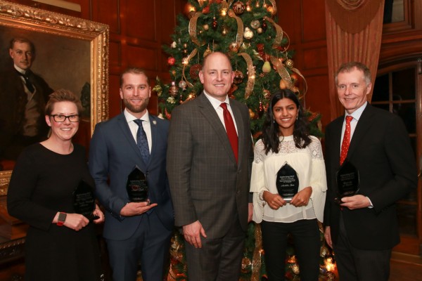 The University of Windsor&#039;s Sarah Woodruff Atkinson, Austin Roth, Anshika Jain and Alan Wildeman pose with Windsor Mayor Drew Dilkens after accepting their Mayor&#039;s Awards on Dec. 19, 2017.