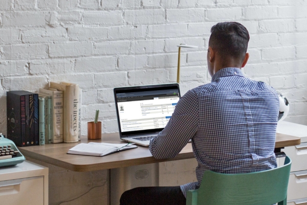 man working at computer