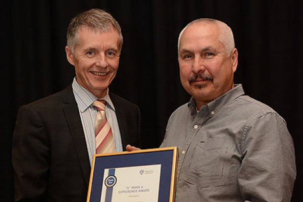 Alan Wildeman congratulates Russell Nahdee