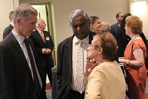 UWindsor president Alan Wildeman converses with WURA president Datta Pillay and retired drama professor Bathsheba Garnett.